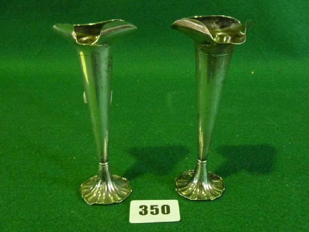 Appraisal: A pair of silver posy vases with folded borders hallmarks