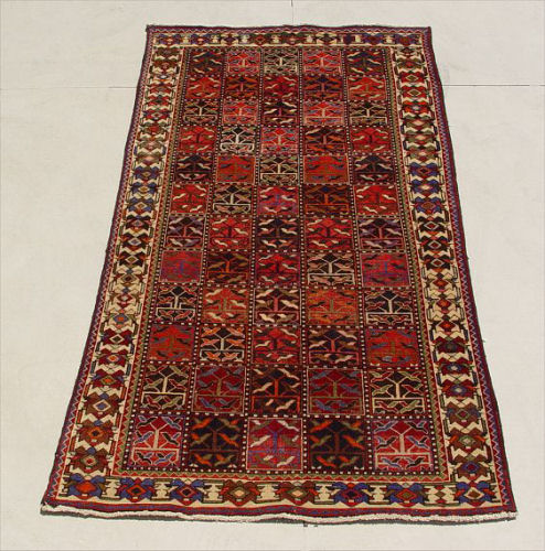 Appraisal: HAND TIED TURKISH CARPET Geometric design Approx ' '' x