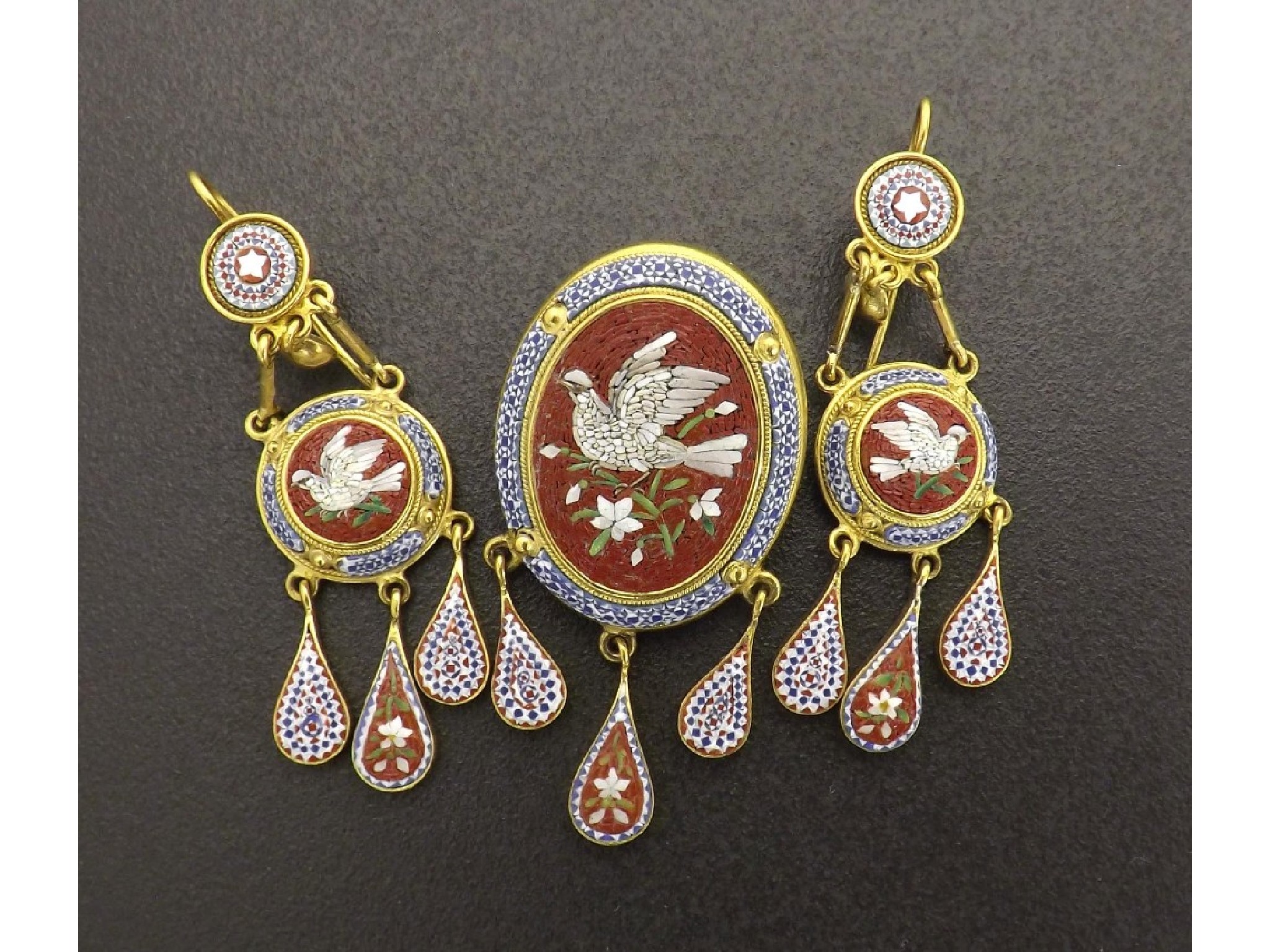 Appraisal: Micromosaic oval brooch and matching earrings each decorated with a