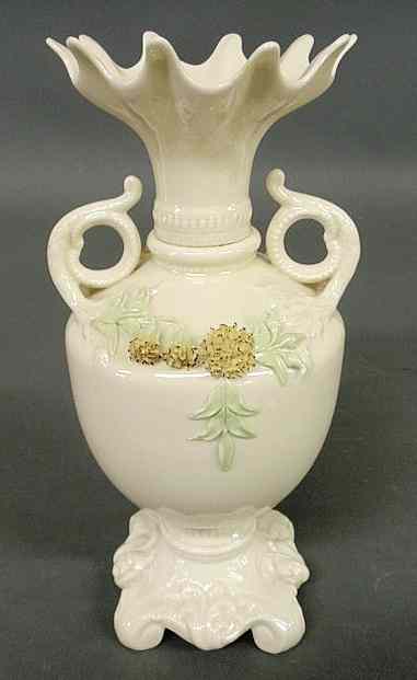 Appraisal: Belleek vase with scrolled handles and floral decoration h