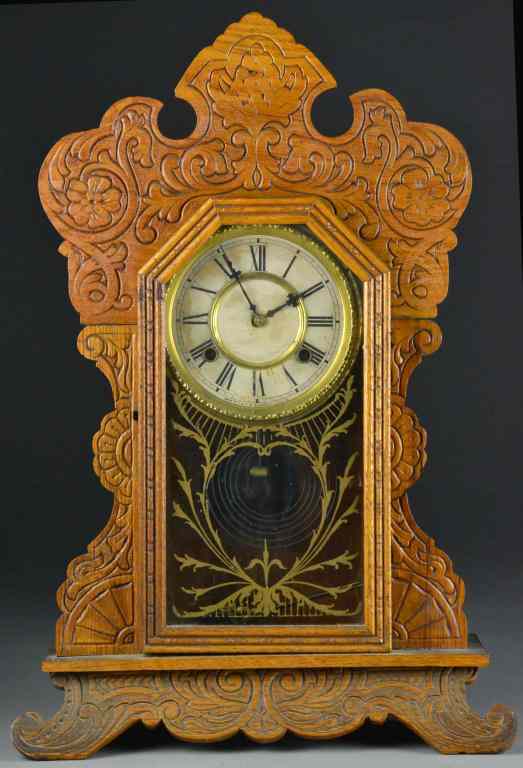 Appraisal: Waterbury Pressed Oak ClockDepicting floral and scroll decoration -day spring