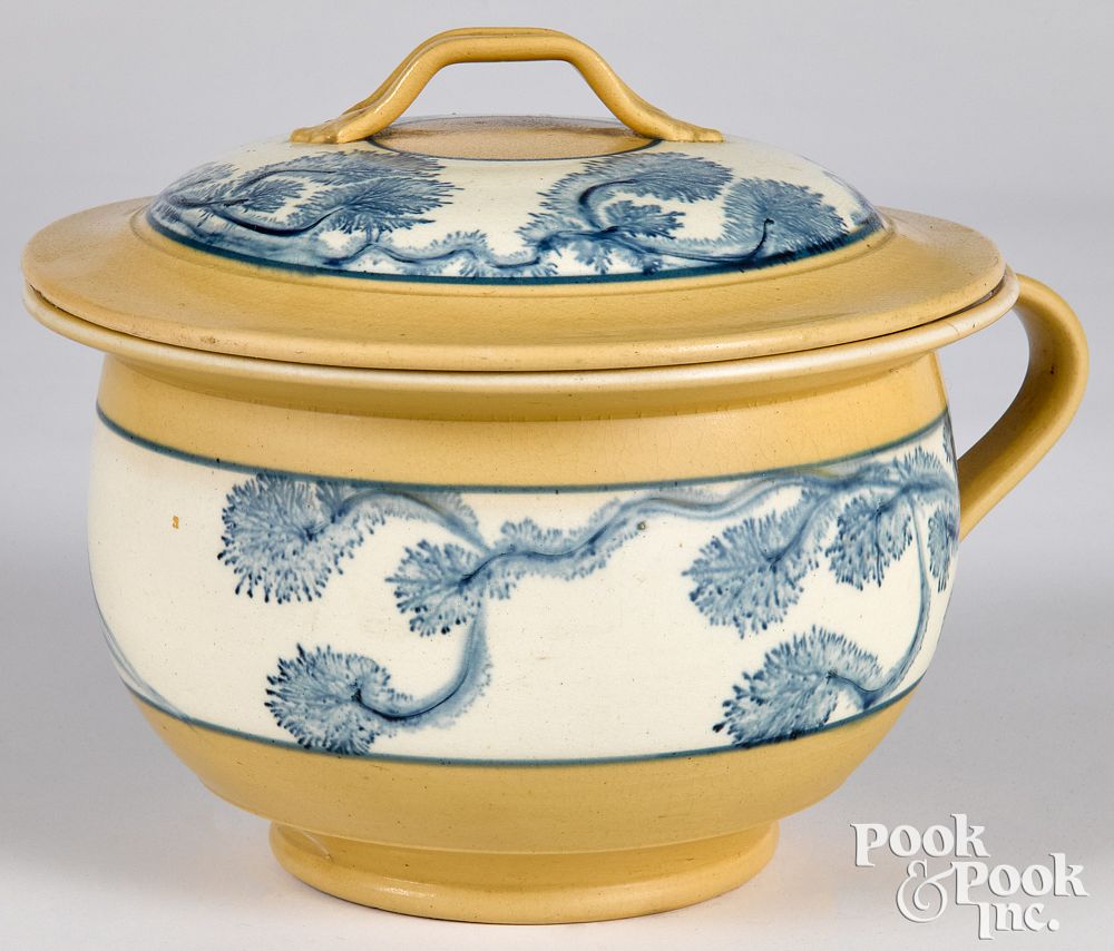 Appraisal: Yellowware lidded pot Yellowware lidded pot with mocha seaweed decoration