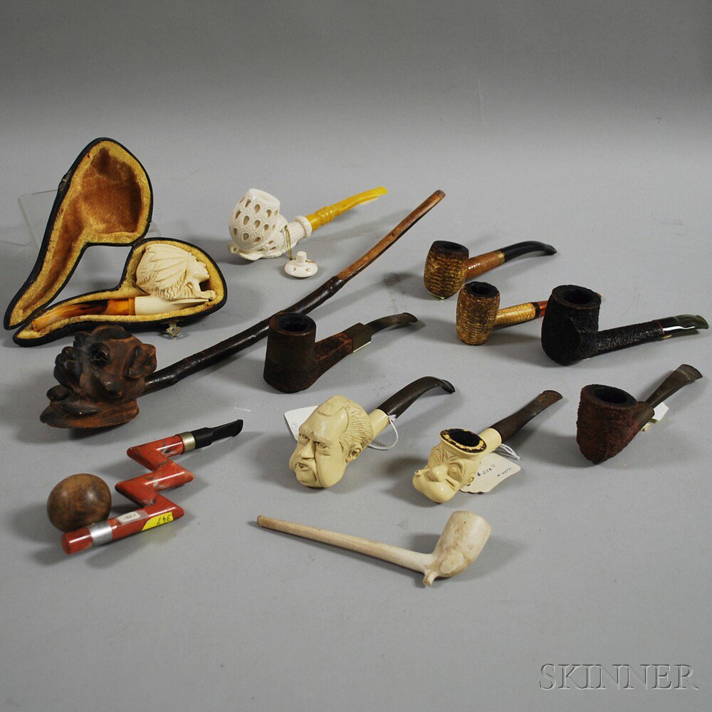 Appraisal: Group of Miscellaneous Pipes including Meerschaum pipes depicting Richard Nixon