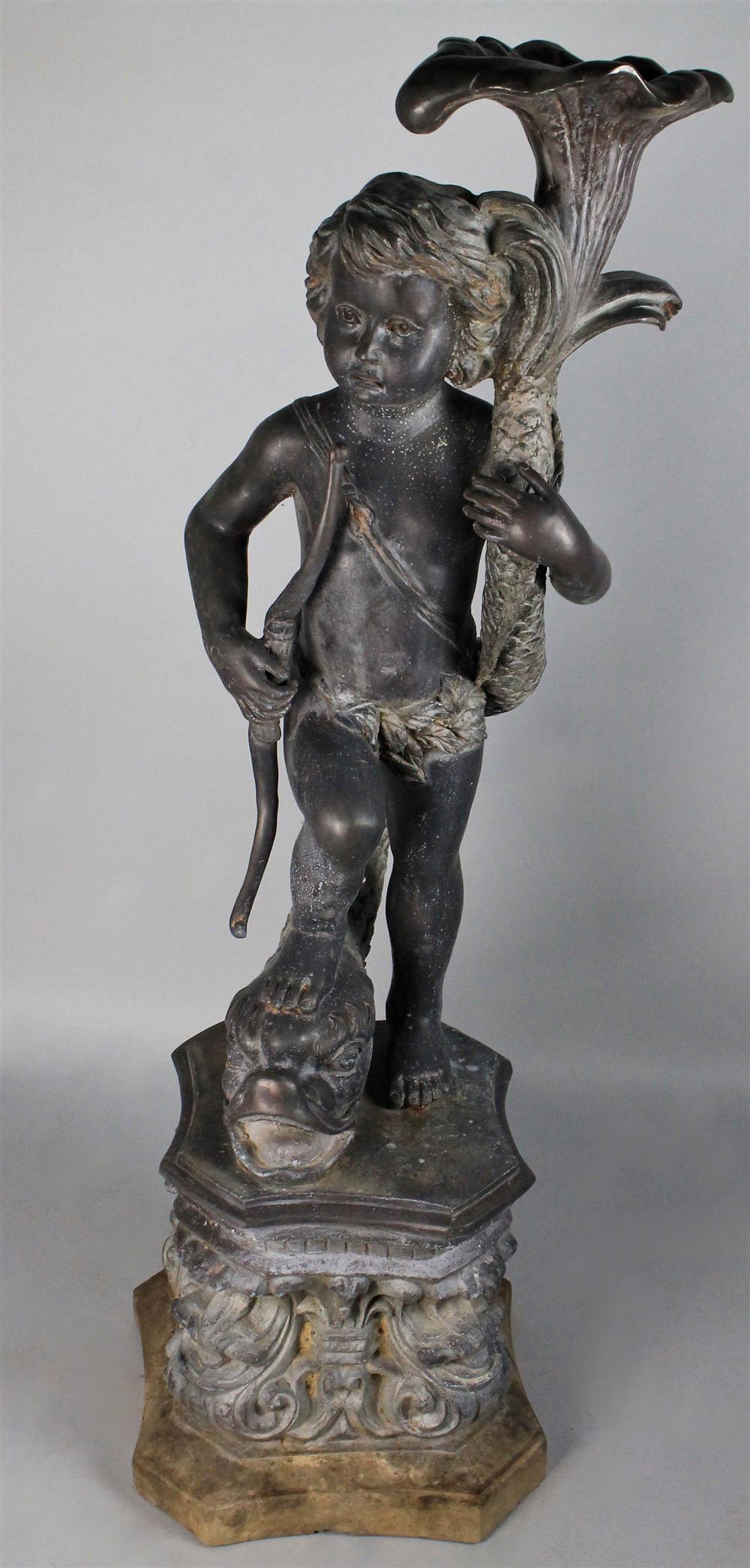 Appraisal: BRONZE FIGURE OF CUPID AND A FISH he holds a