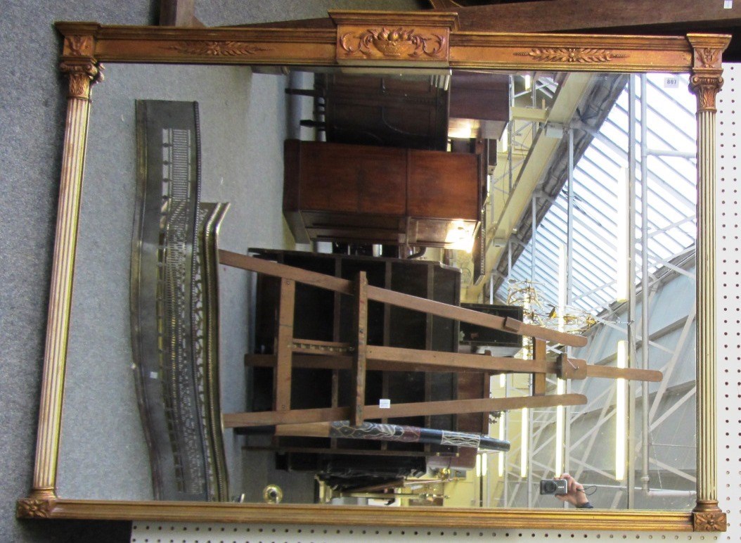 Appraisal: A th century gilt framed overmantel mirror the rectangular plate