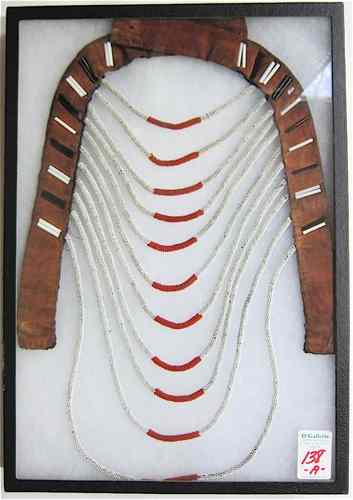 Appraisal: A NATIVE AMERICAN INDIAN BEADED NECK PIECE The shaped textile