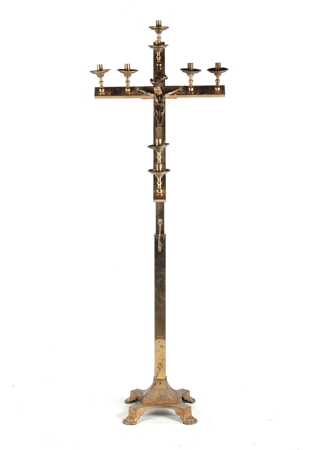 Appraisal: Ecclesiastical figural brass candlestand Cruciform candle holder with crucifix in