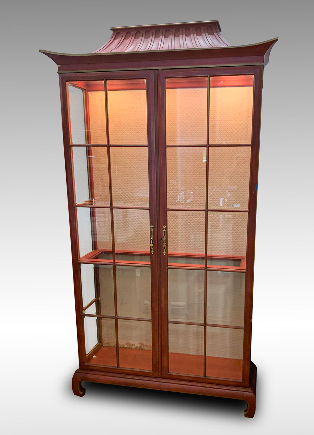 Appraisal: BEVELED GLASS PAGODA FORM CHINA CABINET Red beveled glass Pagoda