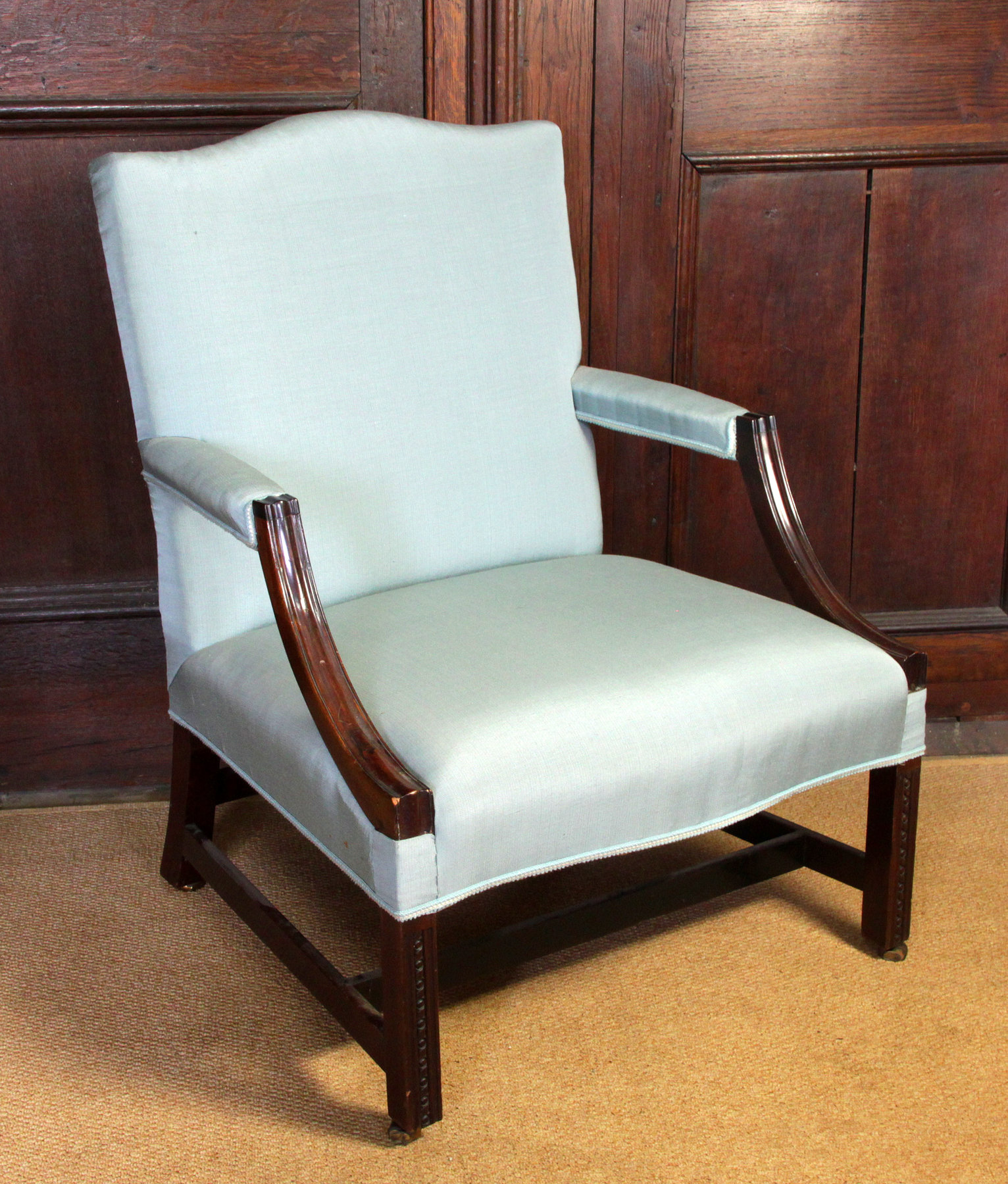 Appraisal: A Gainsborough type armchair with arch top back and moulded