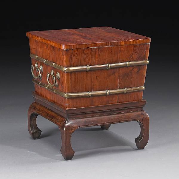 Appraisal: A huanghuali ice chest with walnut base Qing Dynasty Of