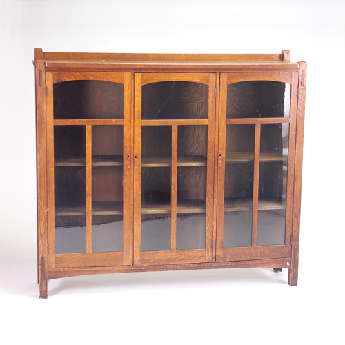 Appraisal: LIMBERT Three-door bookcase no its doors divided in three sections