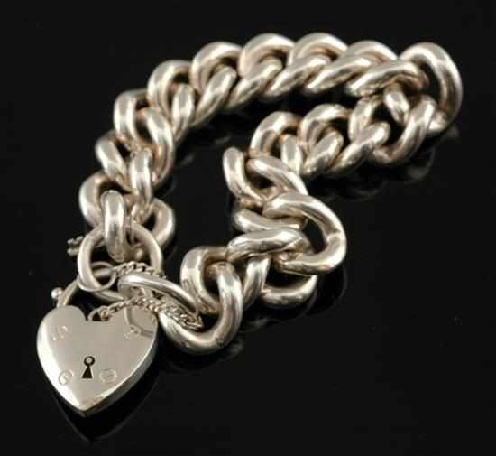 Appraisal: A silver padlock bracelet The curblink bracelet with padlock clasp