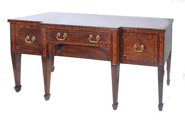 Appraisal: A TH CENTURY MAHOGANY BREAK FRONT SIDEBOARD the top with