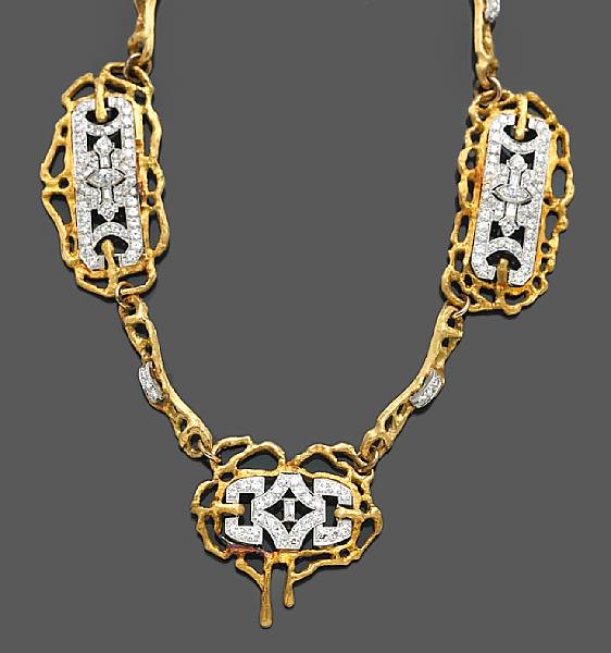 Appraisal: A diamond platinum and eighteen karat gold necklace designed as