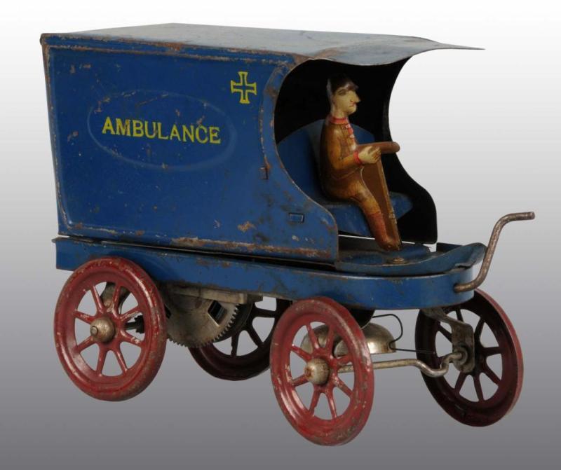 Appraisal: Tin Ambulance Wind-Up Toy Description American Working Marked Ambulance on