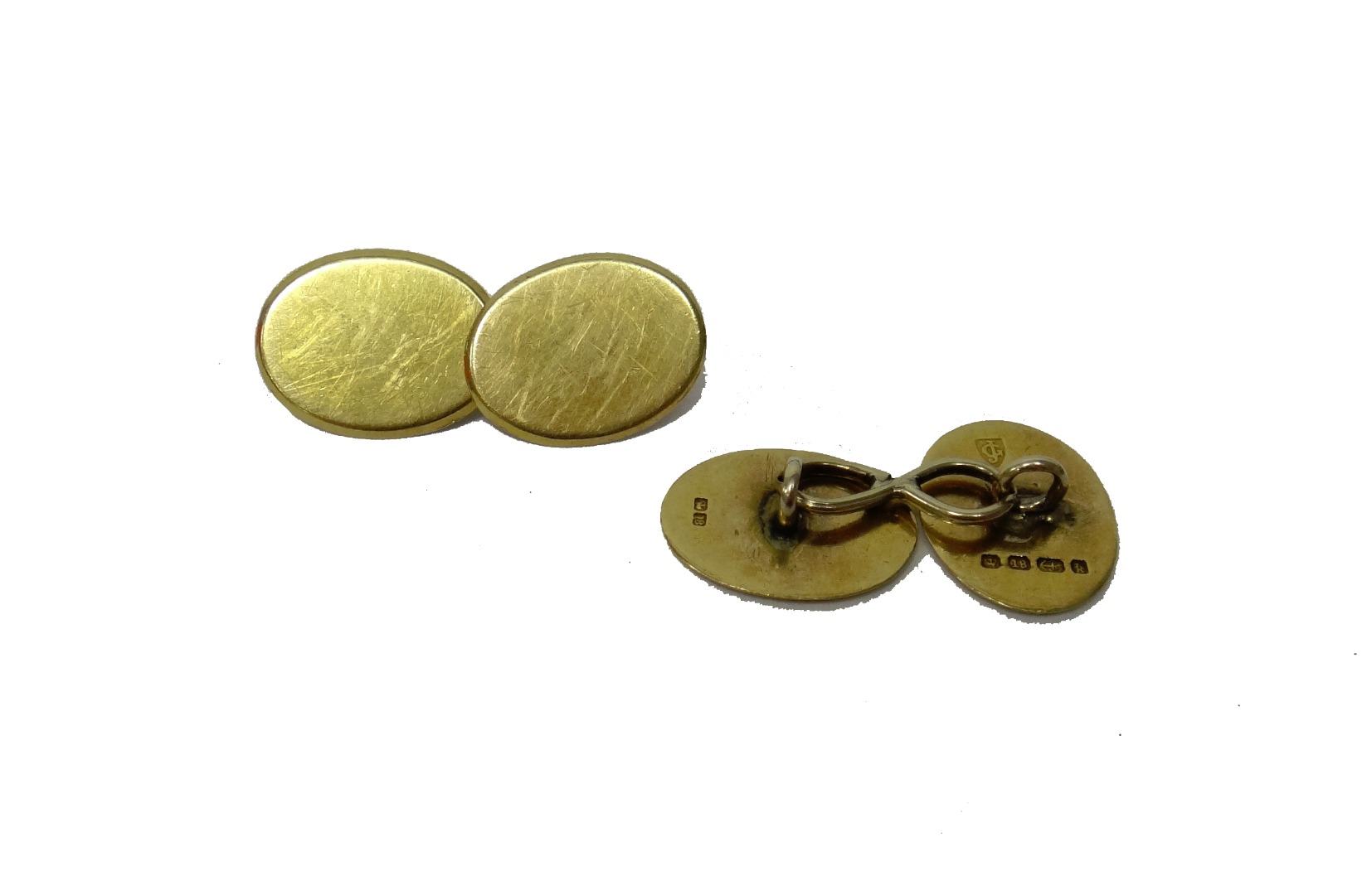 Appraisal: A pair of ct gold cufflinks with plain backs and