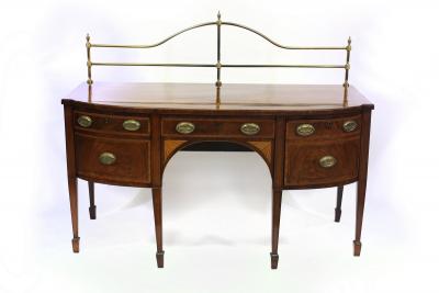 Appraisal: A George III mahogany and inlaid bowfront sideboard with brass