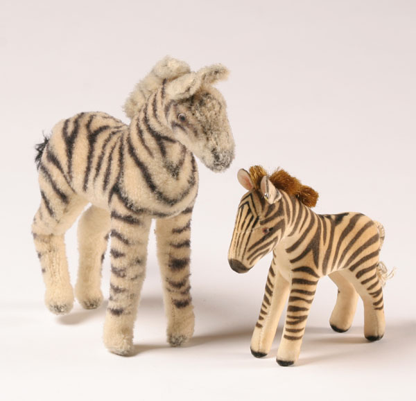 Appraisal: Two Steiff zebras one velvet with button in ear H