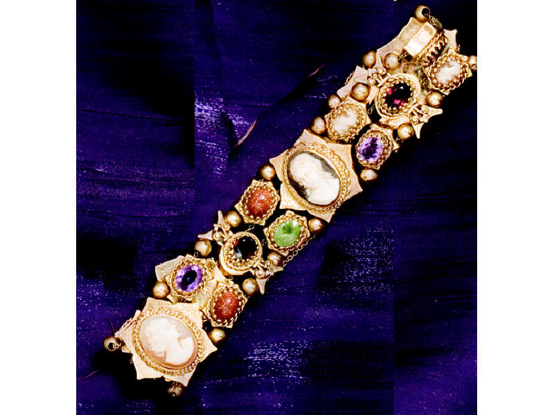 Appraisal: SLIDE BRACELET k yellow gold bracelet with eighteen assorted gemstone