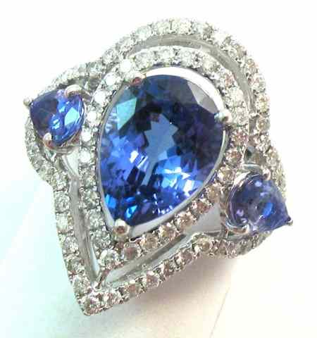 Appraisal: TANZANITE AND DIAMOND RING k white gold set with three