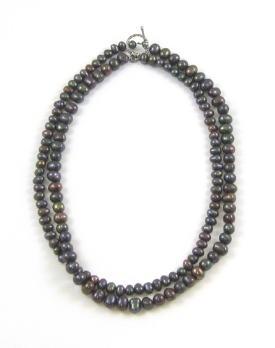 Appraisal: PRINCESS LENGTH BLACK PEACOCK PEARL NECKLACE having double strand with