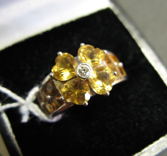 Appraisal: CITRINE DIAMOND AND EIGHTEEN KARAT WHITE GOLD RING set with