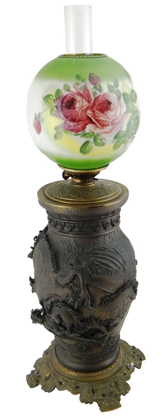 Appraisal: Asian style fluid table lamp converted to electricity two full