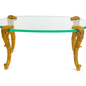 Appraisal: A Gilt Bronze and Turtle-form Glass Top Coffee Table by