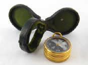 Appraisal: A pocket combined compass and altimeter barometer by Negretti and