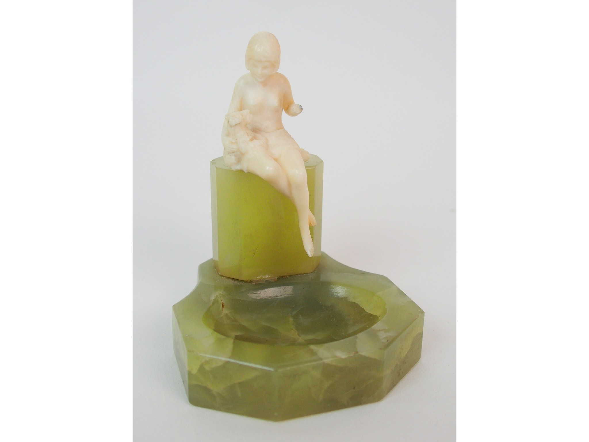 Appraisal: An Art Deco ivory figure on green onyx base attributed