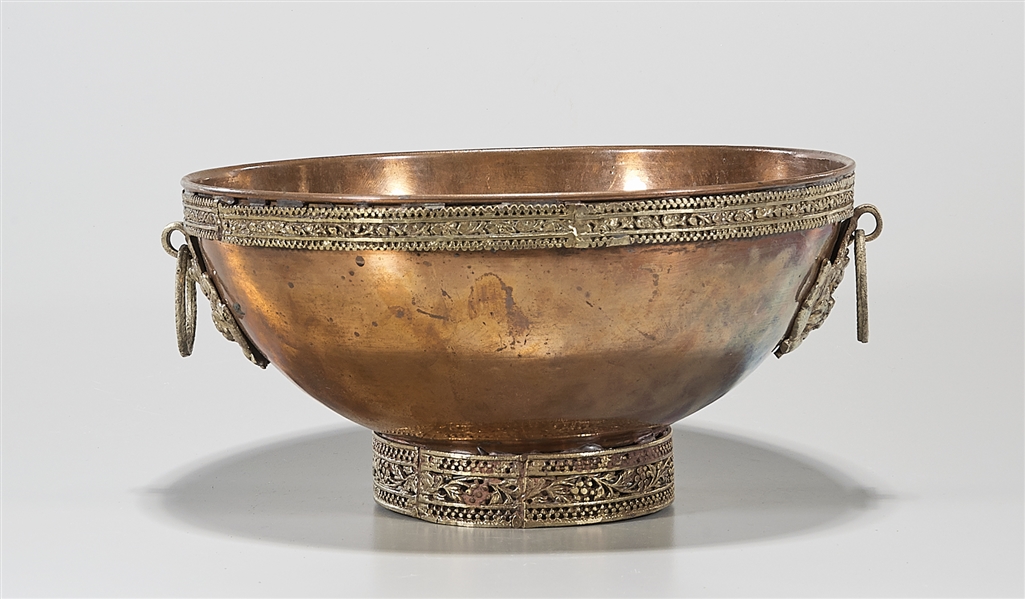 Appraisal: Large copper bowl with openwork embellished rim and foot animal