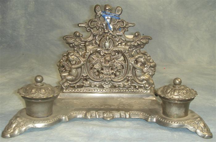 Appraisal: Plated silver Victorian desk stand cherub design w h Estimate