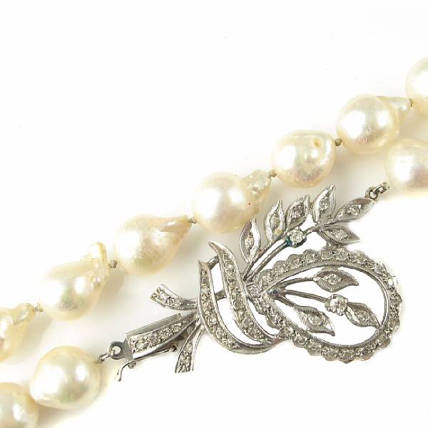 Appraisal: A baroque cultured pearl necklace with diamond and k white