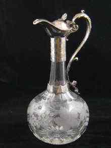 Appraisal: A Victorian claret jug the tall stem facet cut the