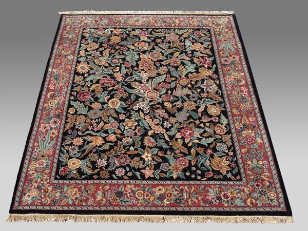 Appraisal: HAND TIED BLACK FIELD JAIPUR ORIENTAL RUG Approx ' ''