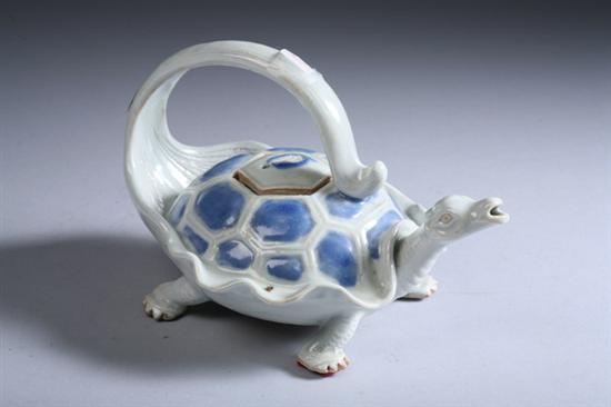 Appraisal: JAPANESE BLUE AND WHITE PORCELAIN TORTOISE-FORM TEAPOT - in long