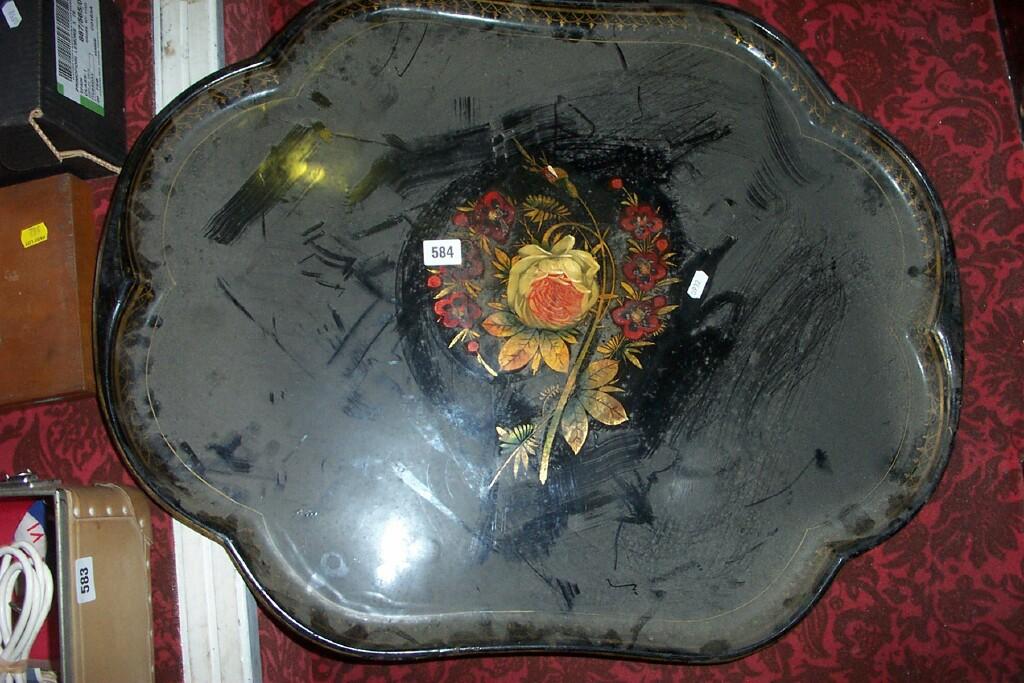 Appraisal: A large th century black ground tin tray with painted