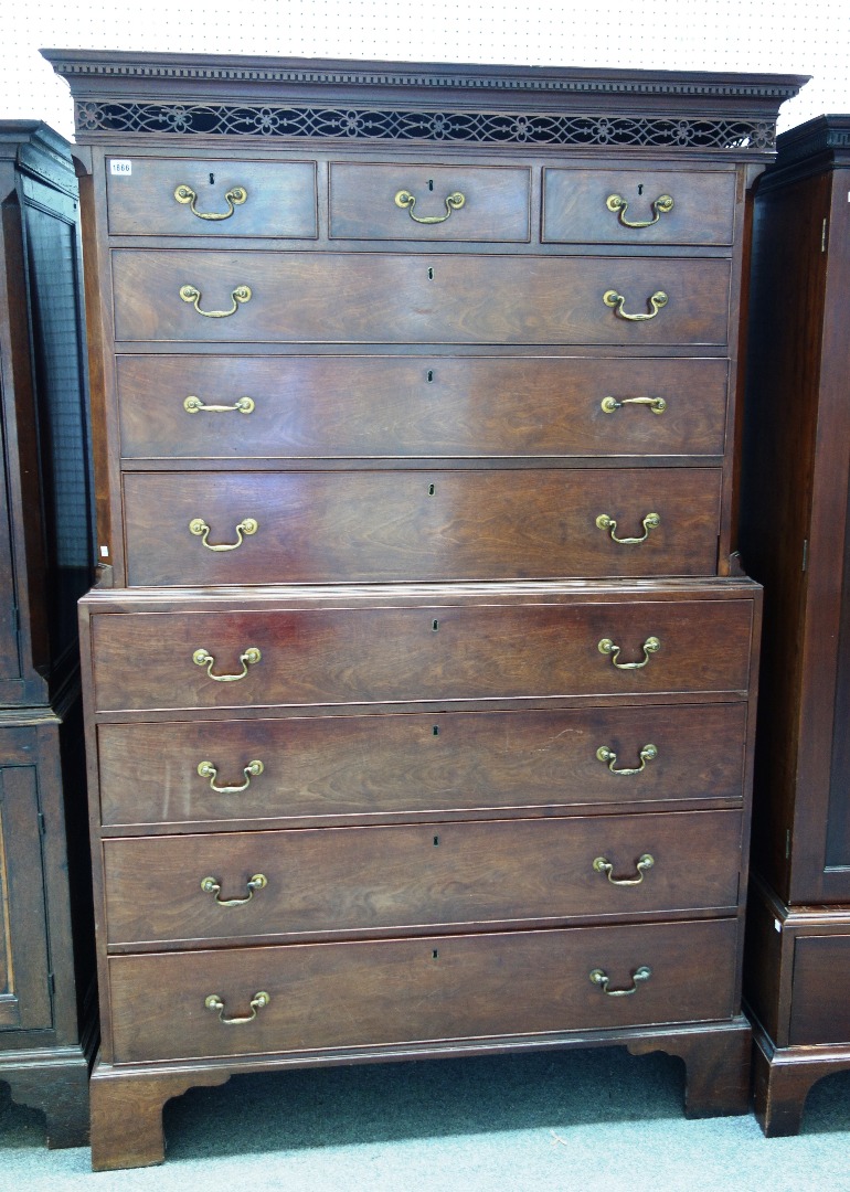 Appraisal: A George III mahogany chest on chest the open fret