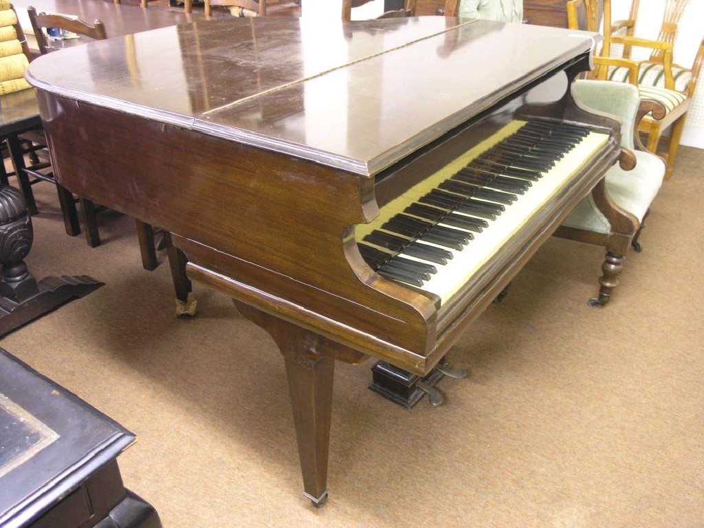 Appraisal: A small mahogany baby-grand piano by Boyd London iron frame