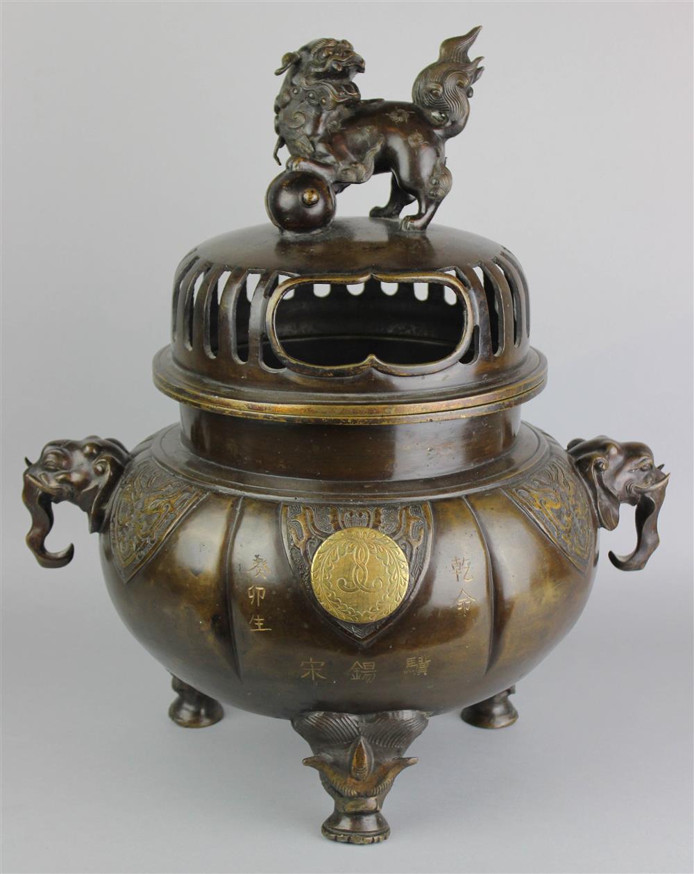 Appraisal: JAPANESE BRONZE TRIPOD CENSER AND COVER WITH MON EDO PERIOD