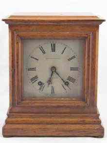 Appraisal: An oak cased striking mantel clock c approx cm in