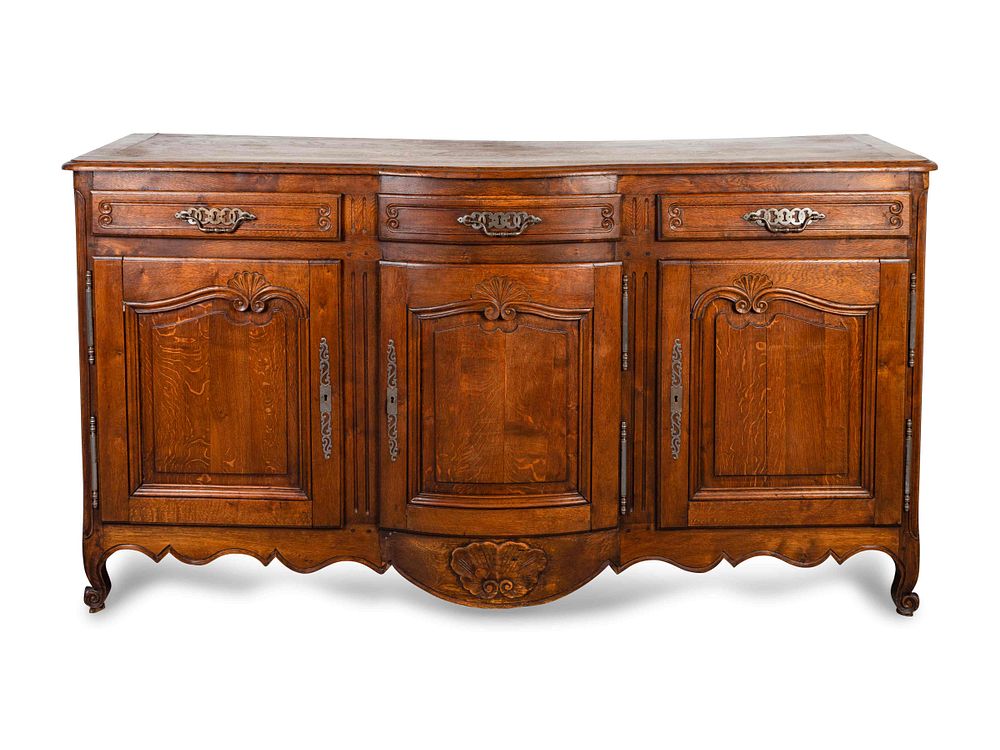 Appraisal: A Louis XV Provincial Style Carved Oak Buffet Height x