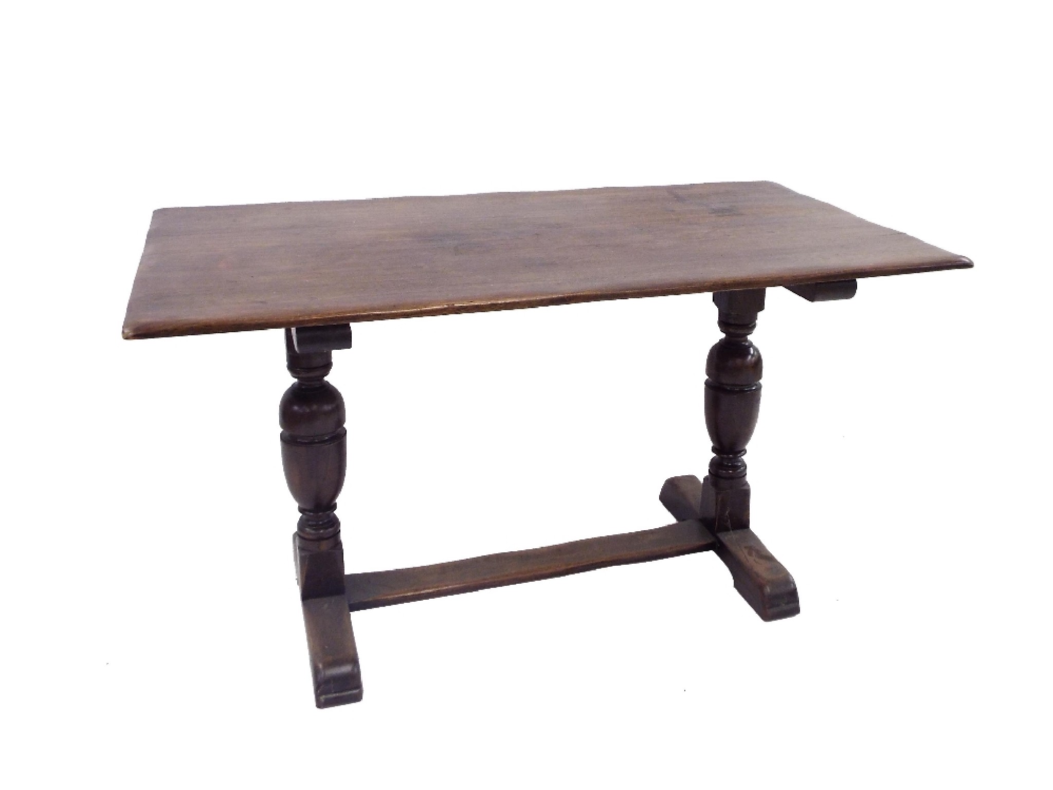 Appraisal: Oak refectory table on cup and cover supports and H-frame