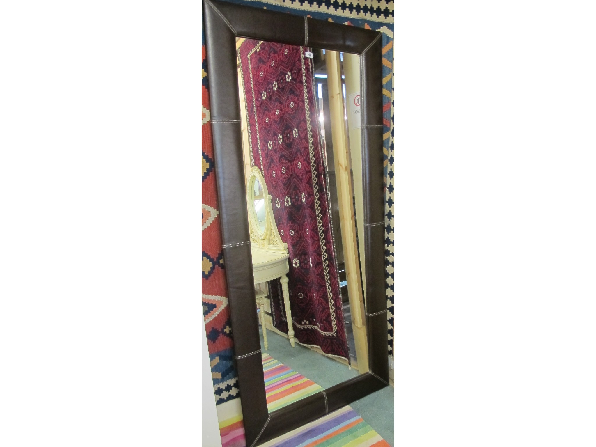 Appraisal: A faux leather brown mirror cm x cm