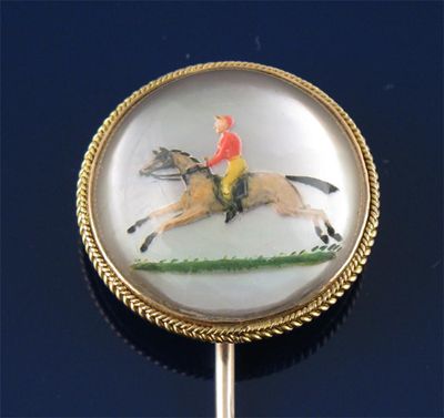 Appraisal: A late th century gold stick pin mounted with a