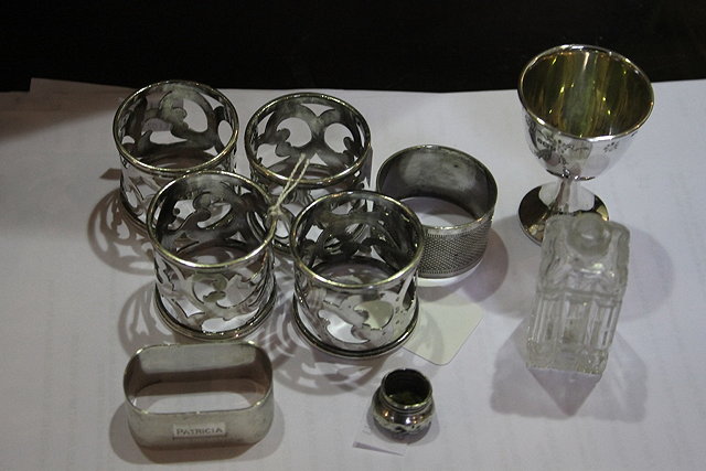 Appraisal: A SET OF FOUR SILVER NAPKIN RINGS a single napkin