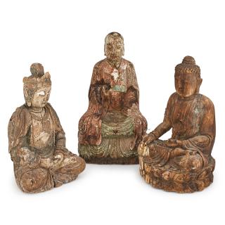 Appraisal: THREE CHINESE WOOD CARVED BUDDHA FIGURES One polychrome painted Buddha