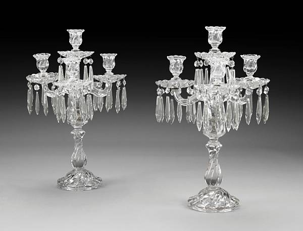 Appraisal: A pair of Baccarat molded glass four light candelabra early