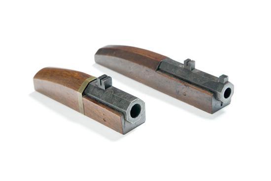 Appraisal: TWO HAND CANNONS Japan th- th century Plain wooden grips