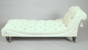 Appraisal: A late Victorian chaise longue of scroll form with button